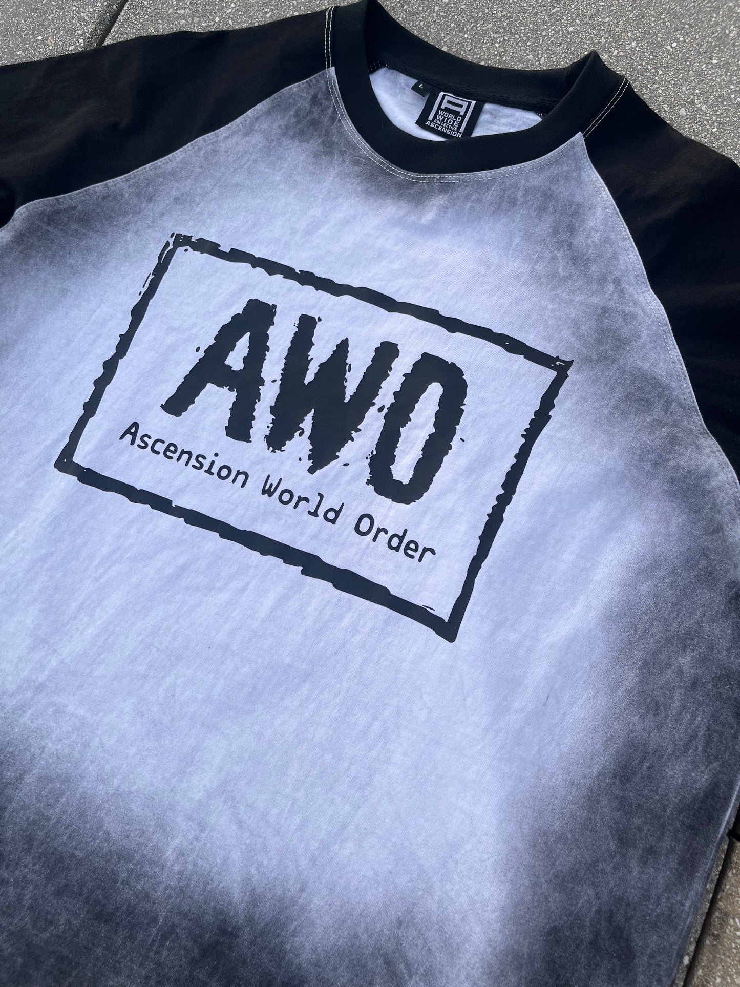 “AWO” RAGLAN TEE